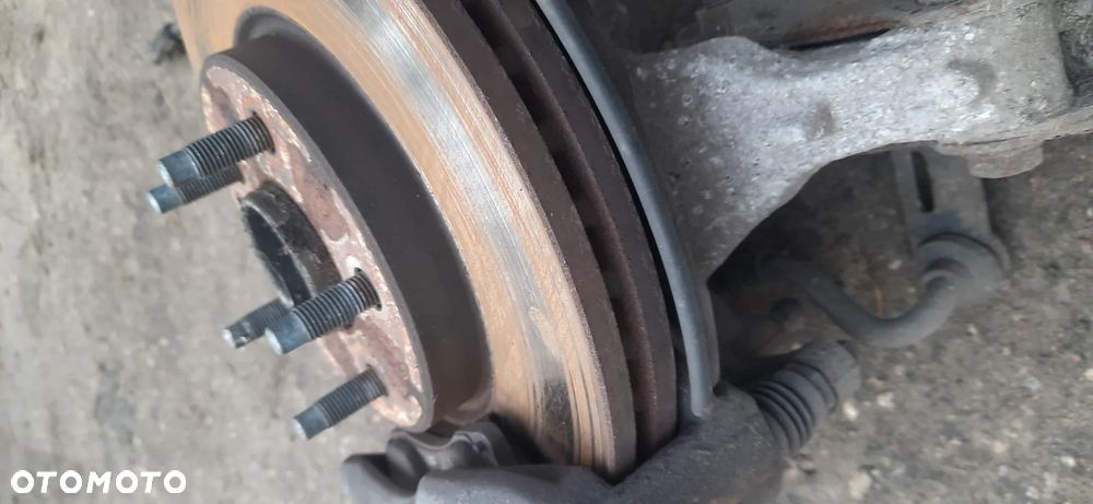 SERWO HAMULCA  - OPEL ASTRA J - 13338058 Astra j 1.4 turbo MacPherson 13354024 13354028 Amortyzator zwrotnica piasta  Kompletna noga - 11