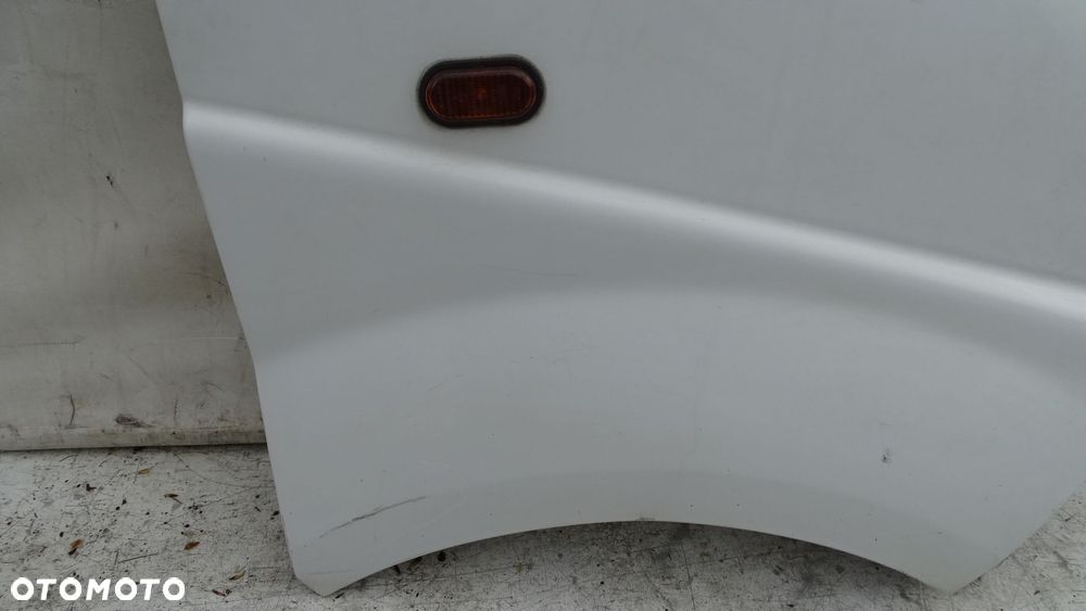 BŁOTNIK PRAWY PRZEDNI OPEL VIVARO 1.9DCI - 2