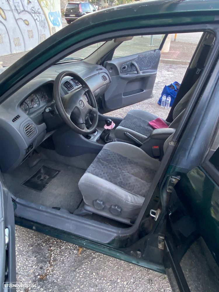 Mazda 323 1.3 - 4
