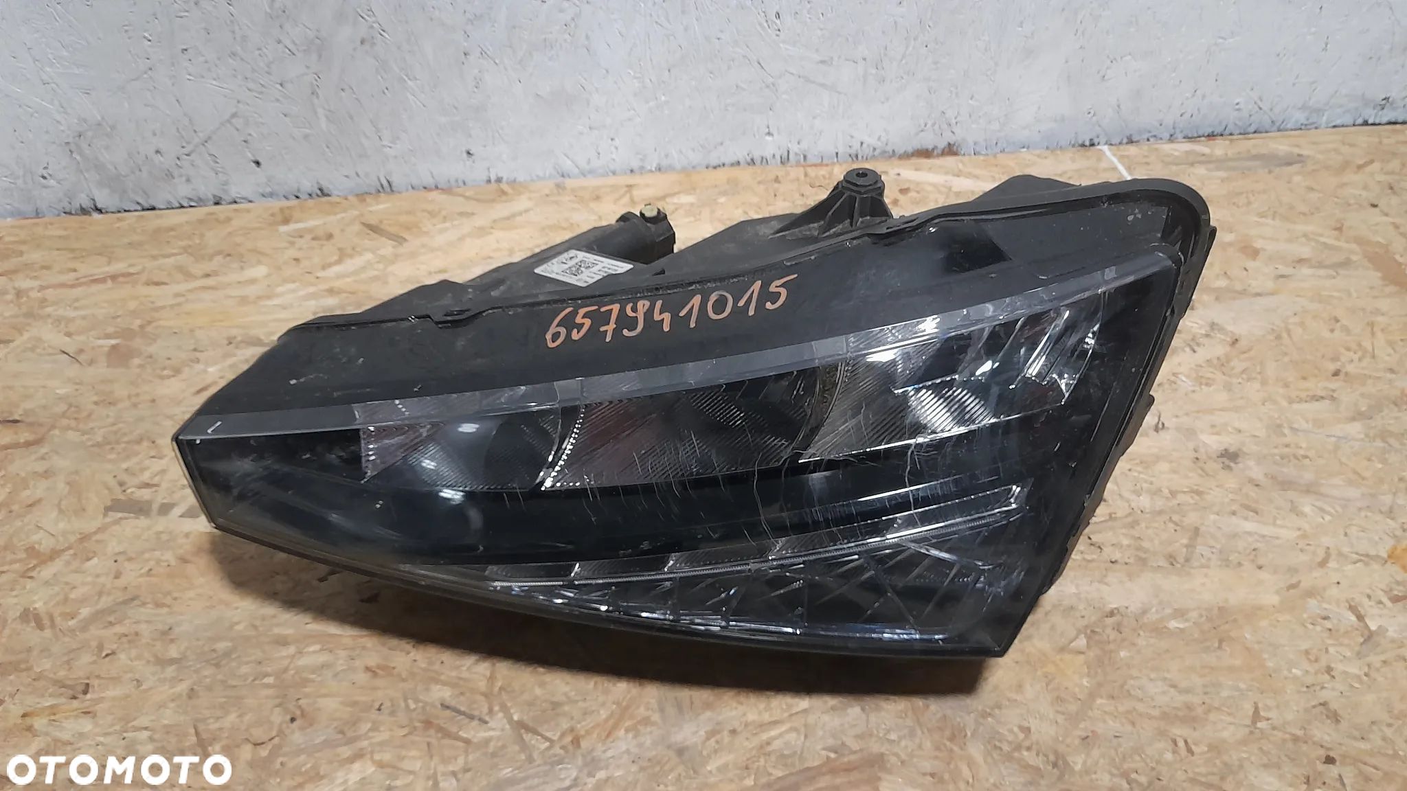 lampa reflektor lewy lewa scala 657941015 uszkodzona - 1