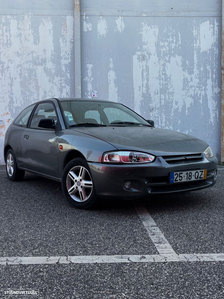 Mitsubishi Colt 1.3 GLX AC+TA+AL - 1