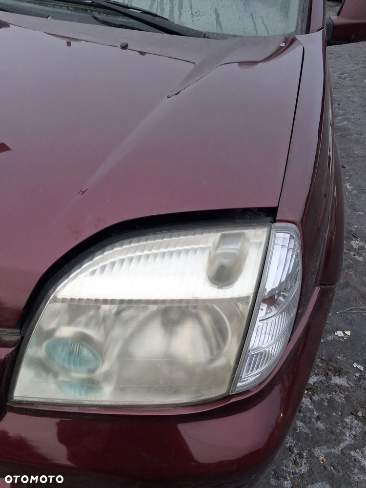 NISSAN X-TRAIL T30 01 REFLEKTOR LEWY LAMPA PRZOD - 1