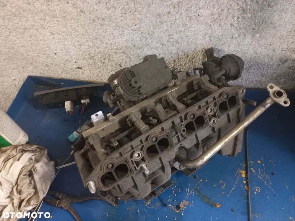 KOLEKTOR SSĄCY 5535196 CORSA C 1.2 16V Z12XEP poznan - 1