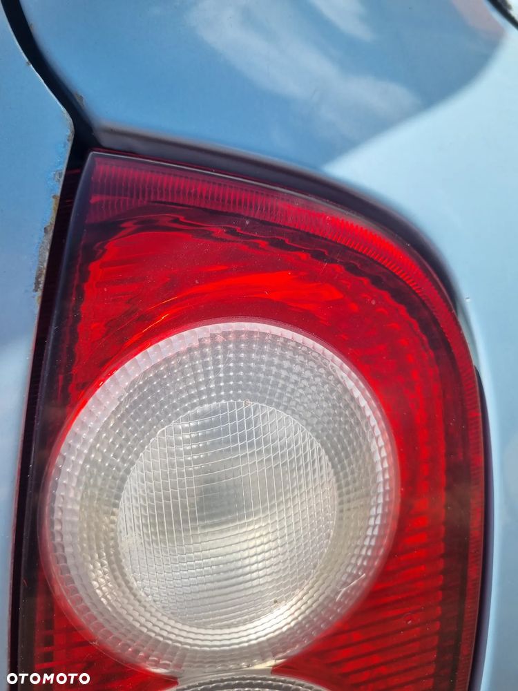 NISSAN MICRA III K12 03-07 2005 r. 5D HB lampa prawy tył prawa PT EU * - 2
