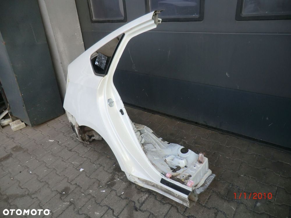 TOYOTA PRIUS III 10- BŁOTNIK PRAWY TYLNY - 2