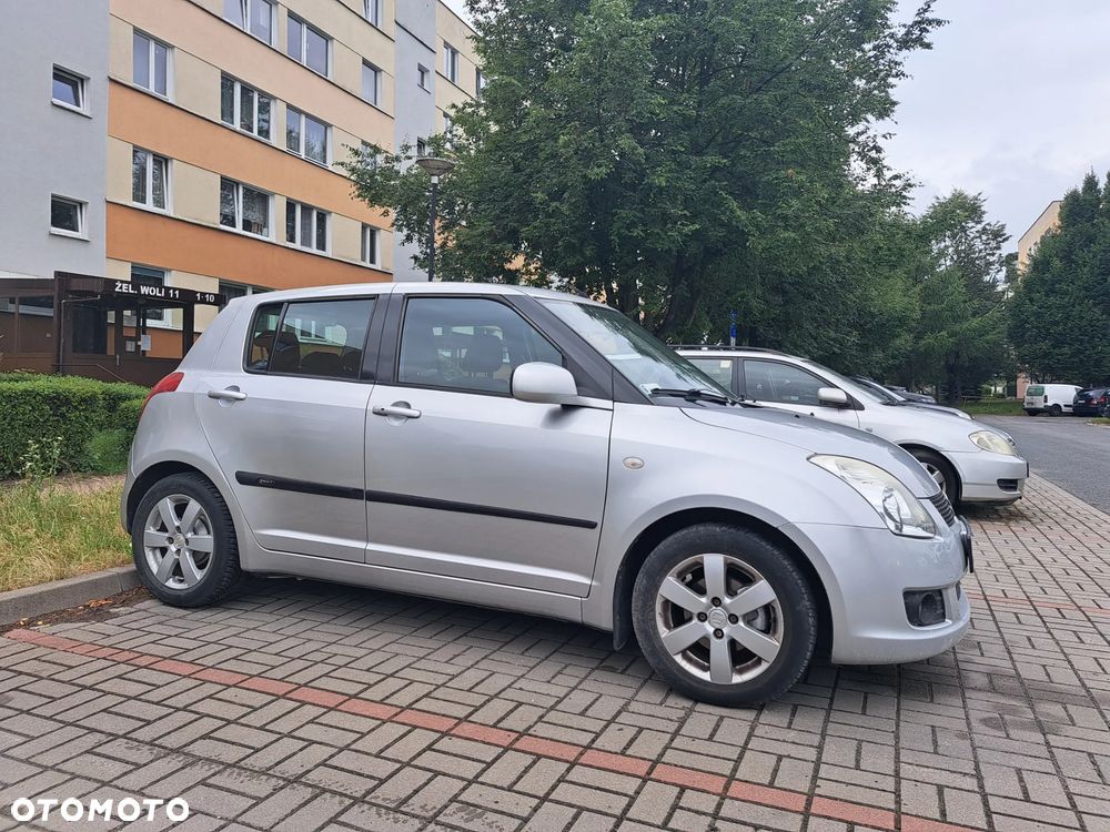 Suzuki Swift 1.5 GLX / Comfort - 4