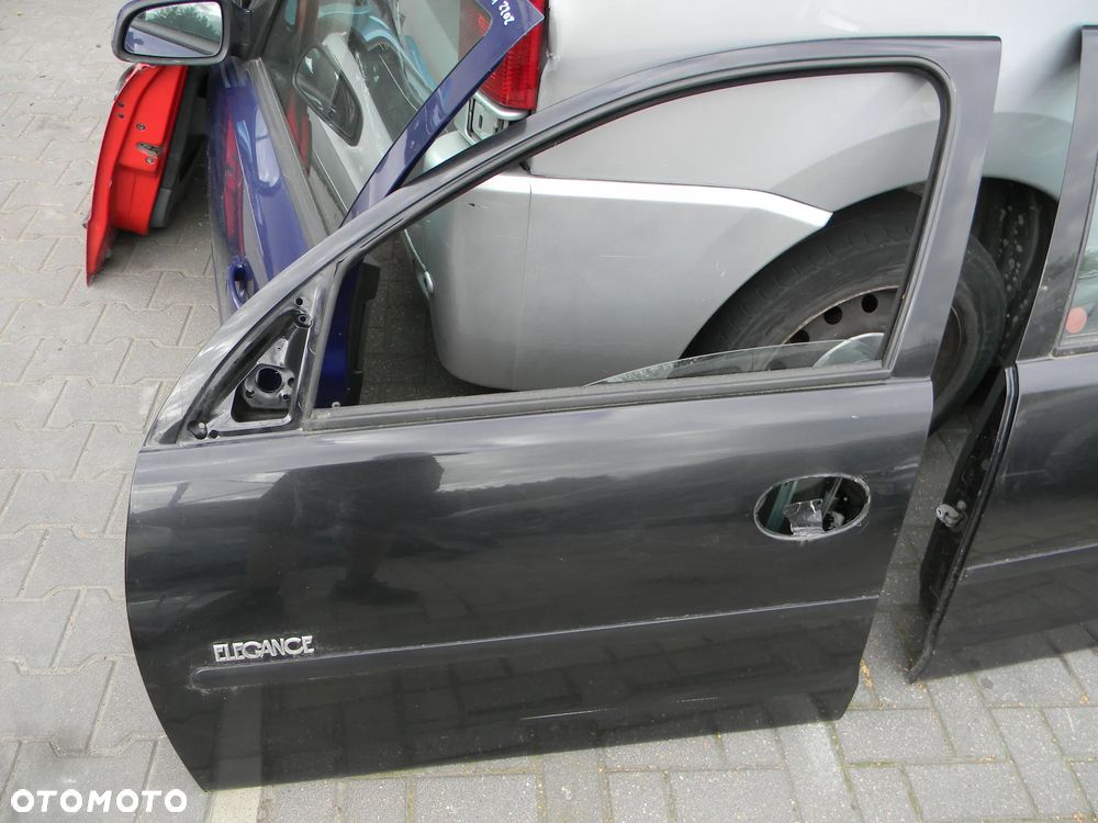 drzwi lewe prawe tył przód OPEL CORSA C 5D Z20R - 2