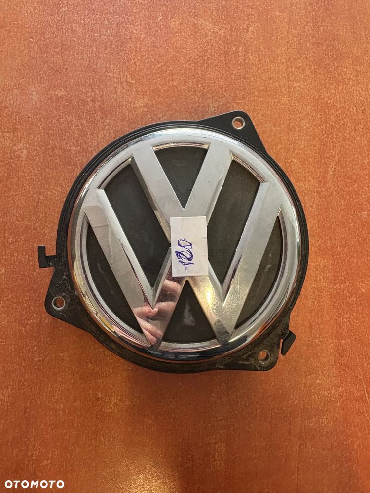 KLAMKA ZNACZEK EMBLEMAT VW OE 6R6827469 - 1