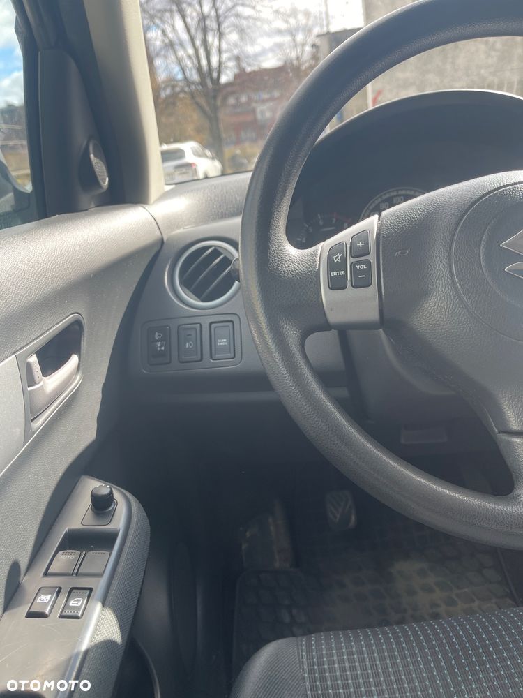 Suzuki Swift 1.3 Sakura - 9