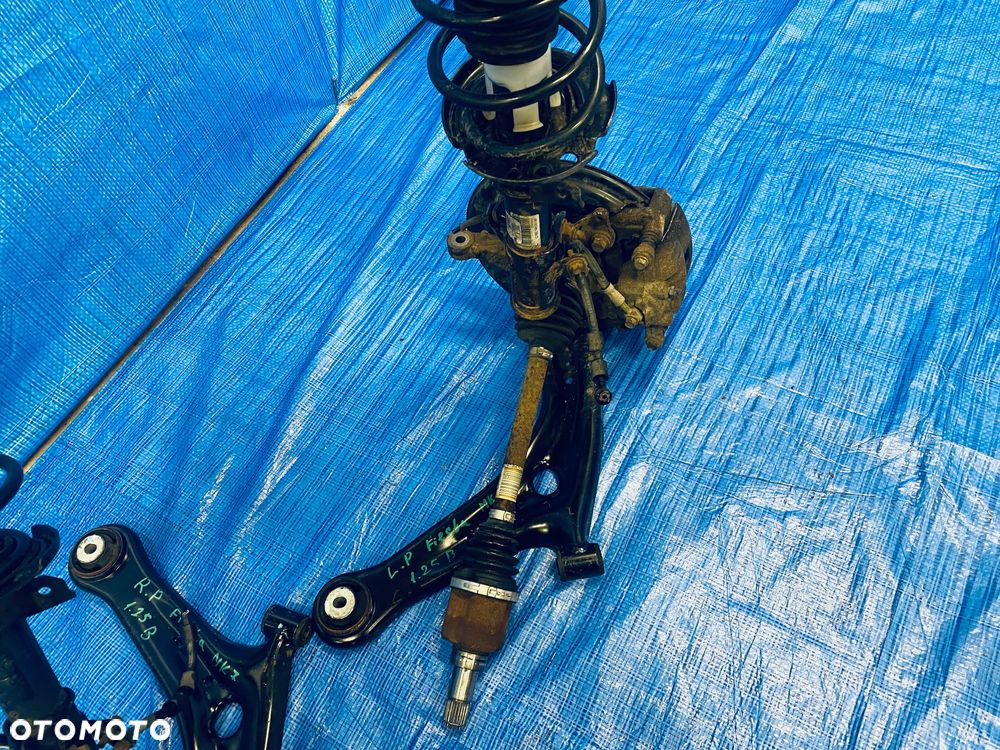 MCPHERSON ZAWIESZENIE ZWROTNICA LEWA PRAWA KOPYTO AMORTYZATOR WAHACZ PÓŁ OŚ PIASTA TARCZA ZACISK KOMPLET LEWY PRAWY PRZÓD PRZEDNIE FORD FIESTA MK7 VII LIFT 1.25BENZYNA 16R ORYGINAŁ - 7