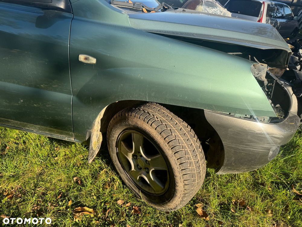KIA SPORTAGE II 04- BŁOTNIK PRAWY PRZÓD - 2