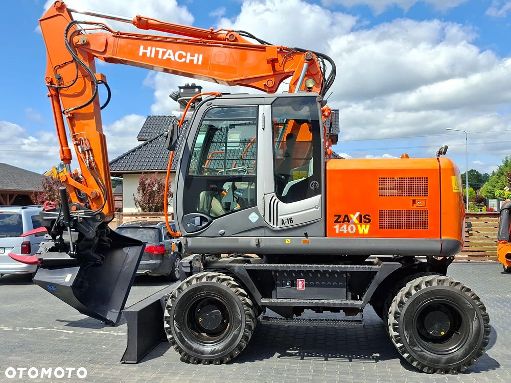 Hitachi ZX140 ROTOTILT - 14