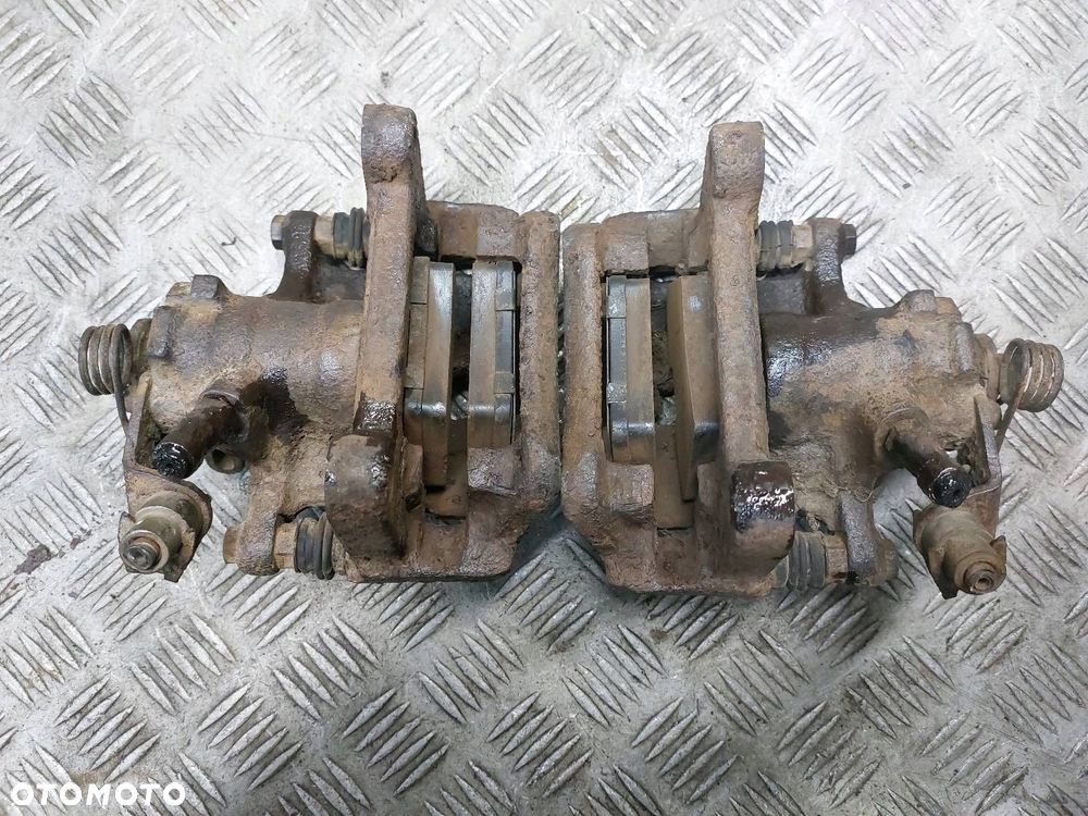 TARCZE HAMULCOWE TYŁ + ZACISKI VOLKSWAGEN TRANSPORTER T4 2.4 D - 9