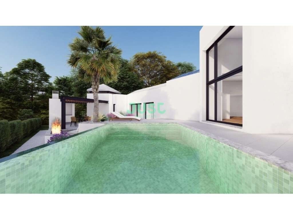 Moradia T4, isolada, com piscina e garagem em um lote com mais de 1... - Grande imagem: 5/52