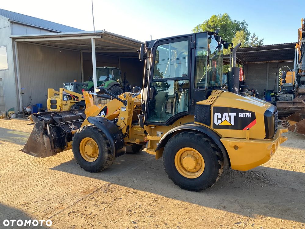Caterpillar CAT 907H, 2012 ROK, ŁYŻKA OTWIERANA + WIDŁY, z NIEMIEC - 3