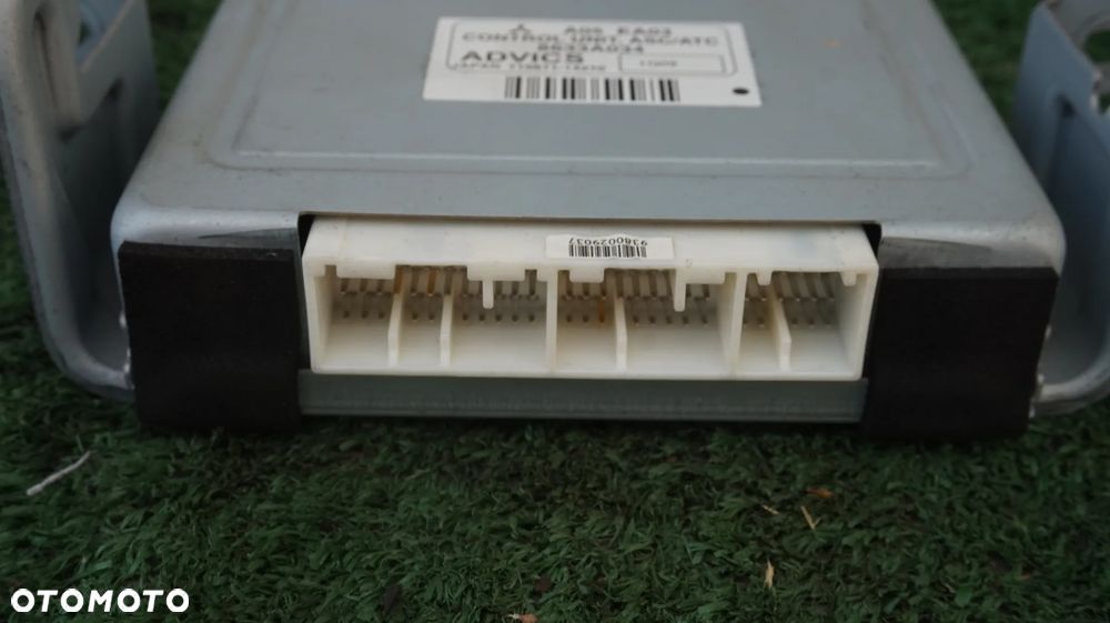 Mitsubishi Pajero IV 3.2 DID 5D LONG sterownik modul kontroli trakcji 8633A034 - 2