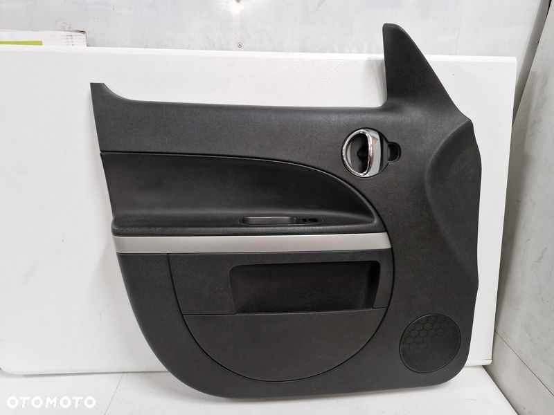 chevrolet hhr boczek drzwi lewy przód przedni tapicerka 15923679 - 1