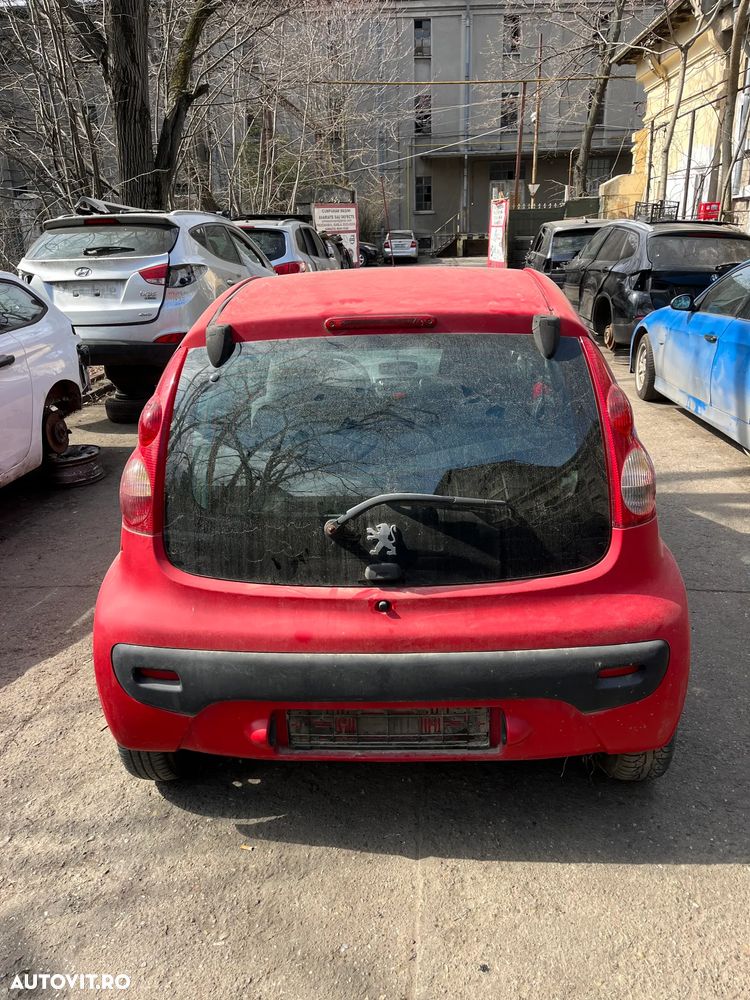 Dezmembrez Peugeot 107 rosu 2007 1.0 benzina 4usi - 9
