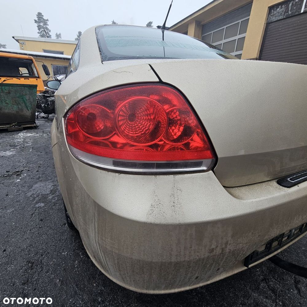 Fiat Linea 1,4 B 57kW / 78 KM (kod lak: 261) pojazd na części: maska, zderzak, drzwi, szyby, lusterka, chłodnica... - 10