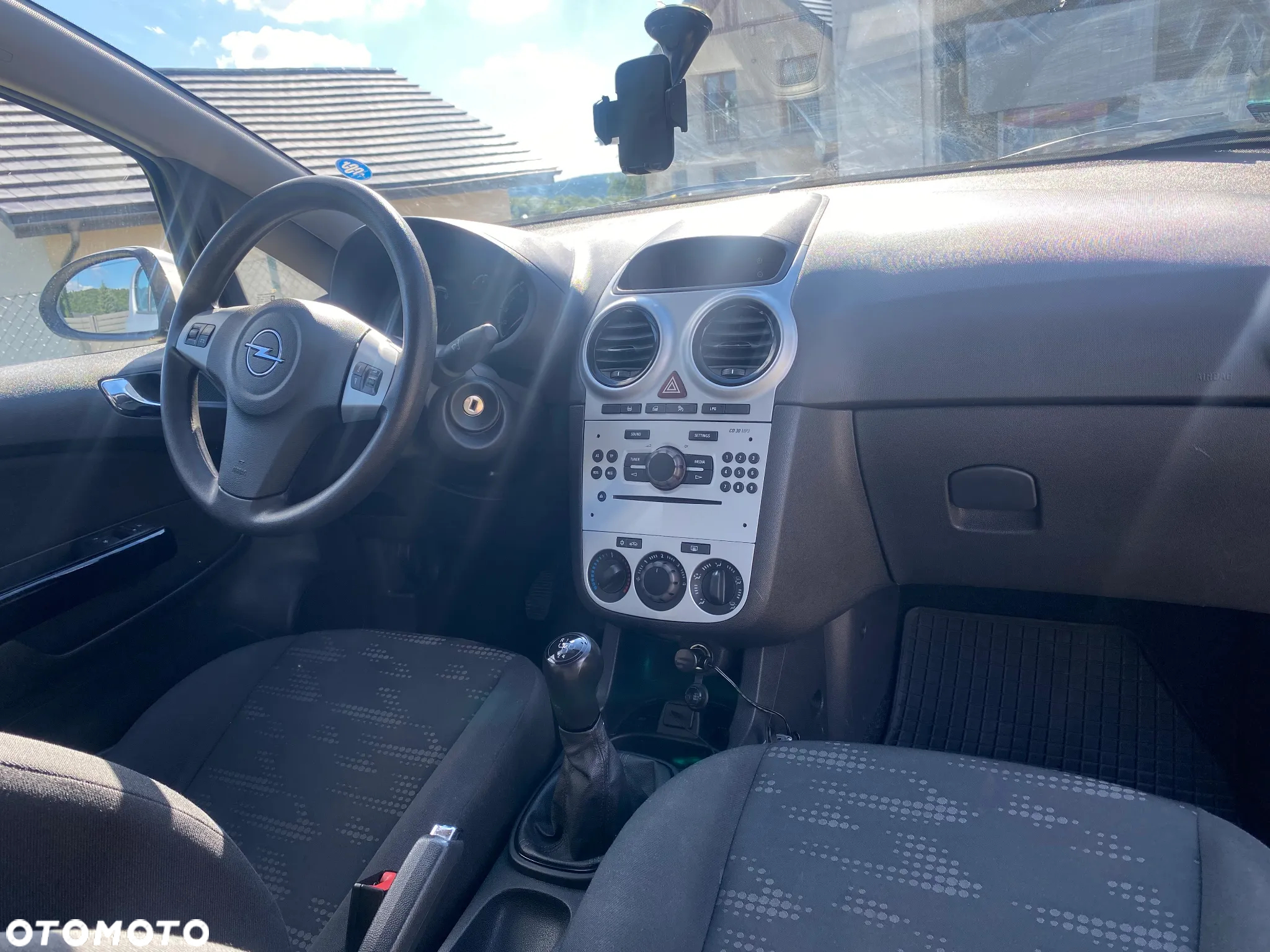 Opel Corsa 1.2 16V Enjoy - 21