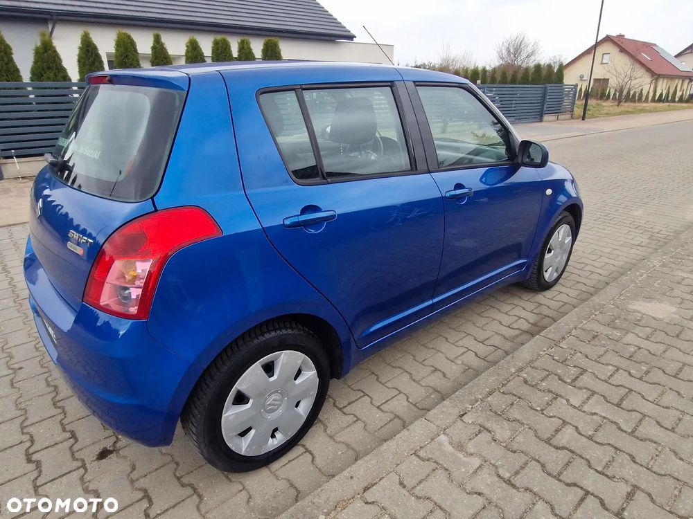 Suzuki Swift 1.3 Sakura - 40