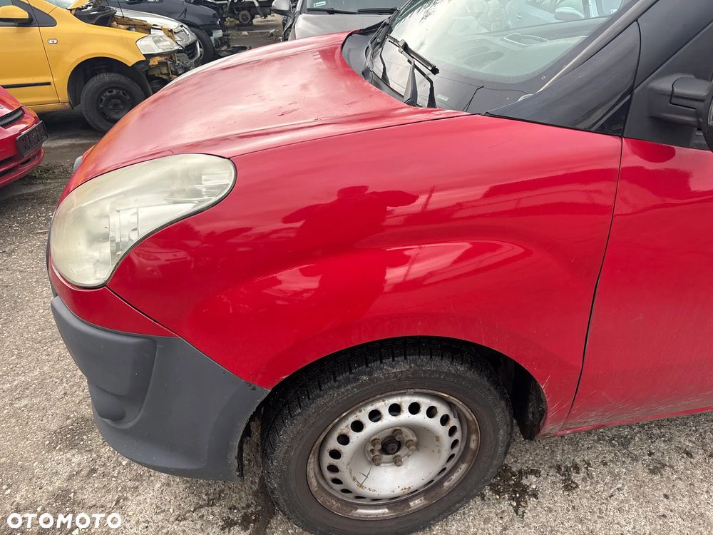 BŁOTNIK LEWY FIAT DOBLO 2010R NR LAKIERU 168 - 1