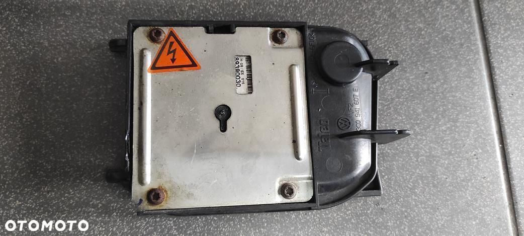 PRZETWORNICA DEKIEL LAMPY LEWEJ PASSAT B6 XENON - 1