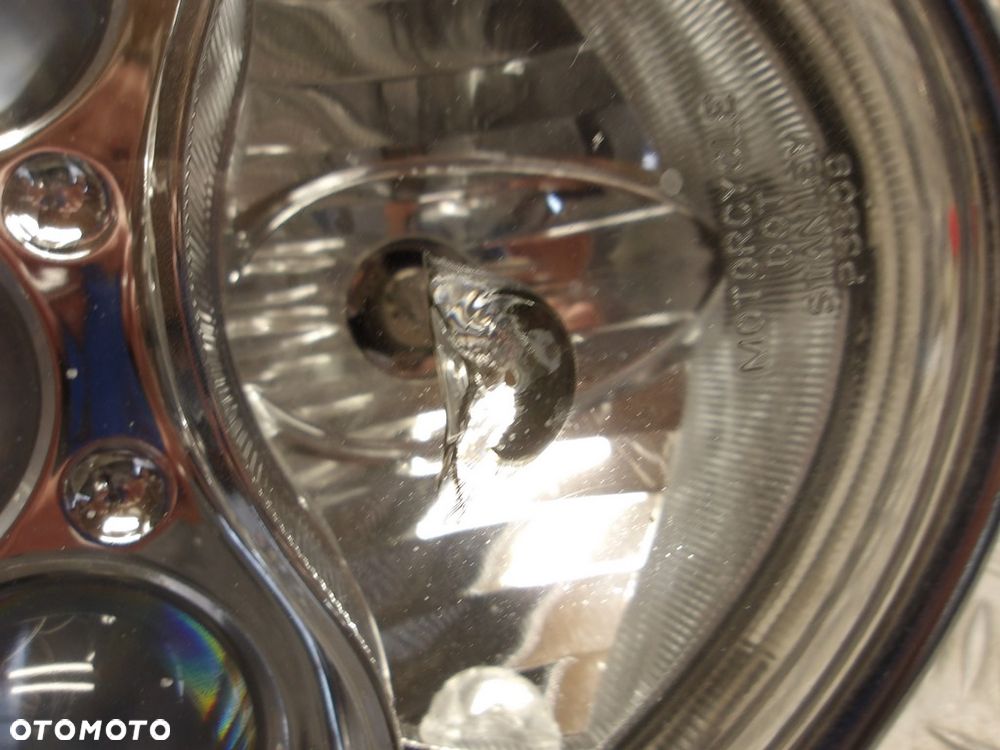 Lampa przód reflektor KAWASAKI VN 2000 VULCAN 04-09r   PN. 23007-0028 - 7