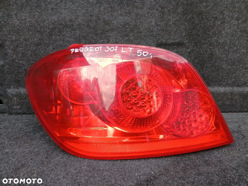 Peugeot 307 HB Lift lampa tylna  lewa. - 3