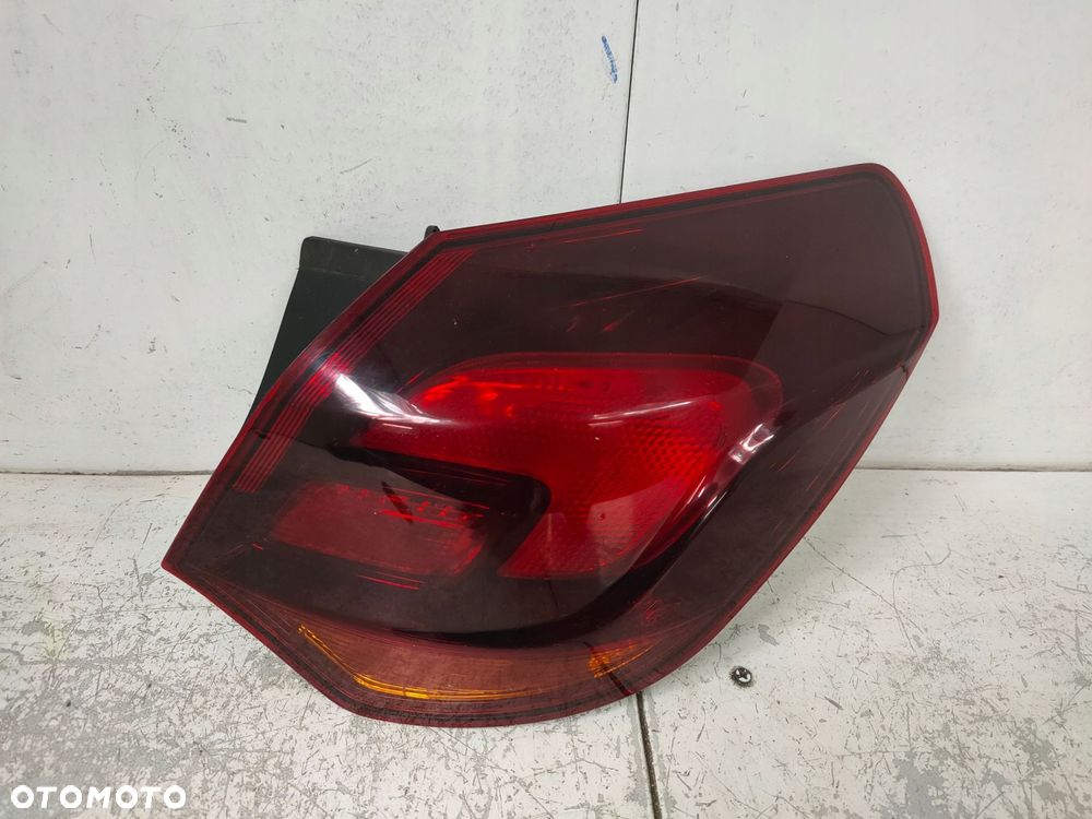 lampa prawa tył opel astra 4 j 5d hb ciemna ładna