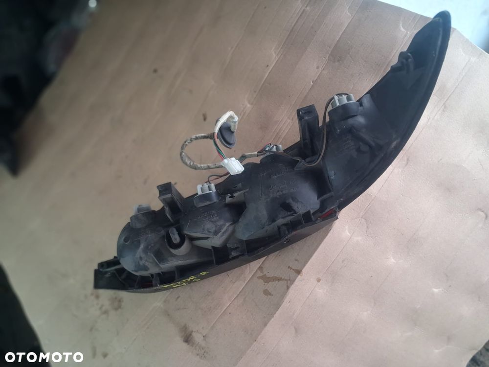 Lampa tył MAZDA MX 3 lewa prawa  OE - 4