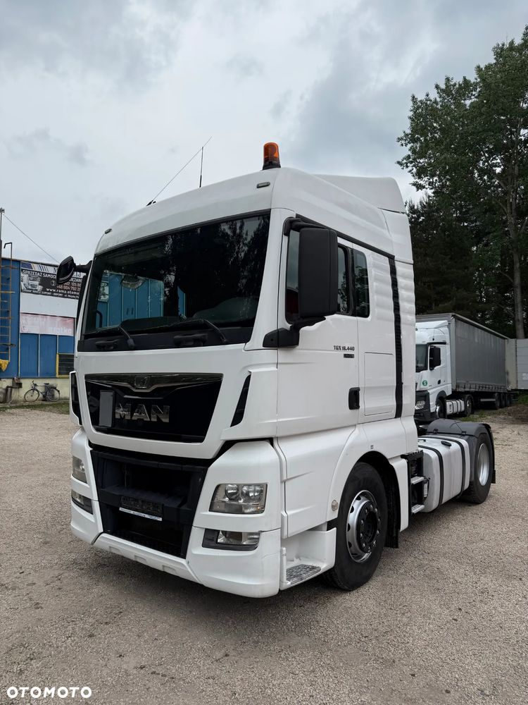 MAN TGX 18.440 XLX AUTOMAT SPOJLERY KLIMA WEBASTO LODÓWKA 685000km MOTOR:12.5L OPONY:315/80/22.5-80% 2xALUTANK EURO 6 2014 - 1