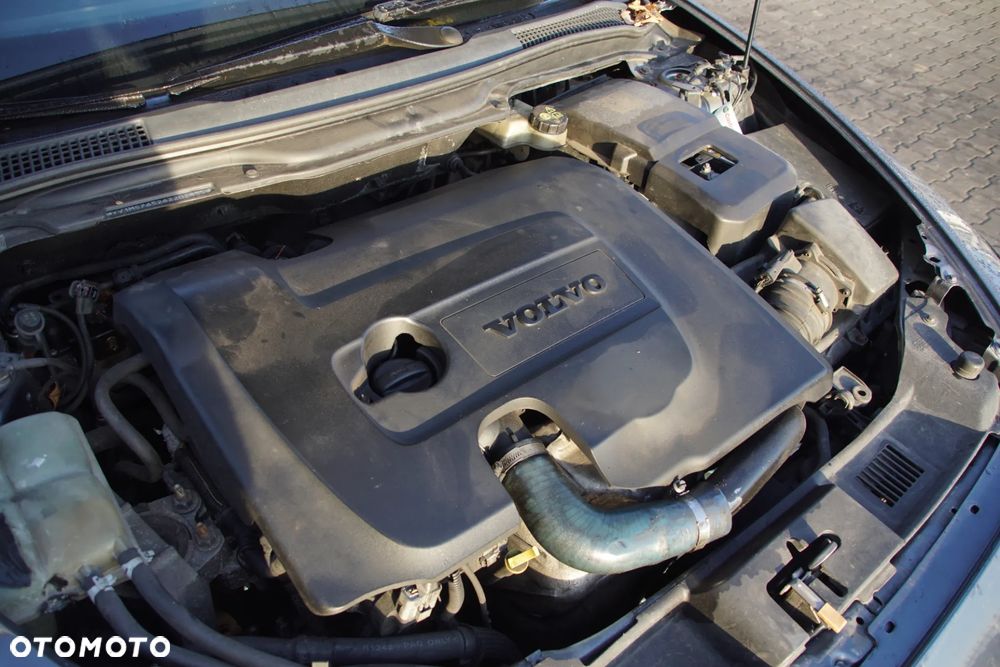 Auto na części - Volvo S40 II 1.6 D 109 KM D4164T MTX75 455 2006R Silnik Skrzynia Drzwi Błotnik Klapa Zderzak Lusterko Szyba Klamka Deska Kokpit Sterownik Moduł Czujnik Licznik Kierownica Wyświetlacz Panel - 19