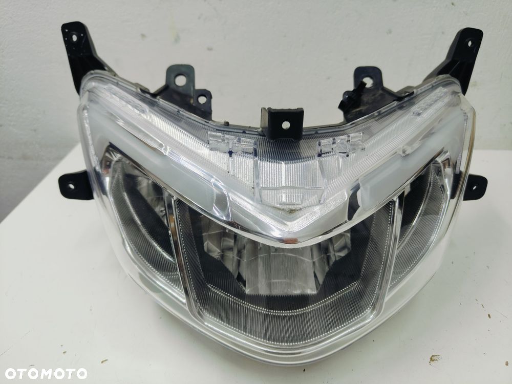 Reflektor Suzuki Burgman  Street 125  (23-25)r - 2