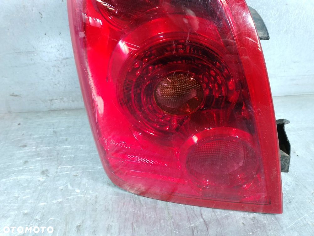 LAMPA TYLNA LEWA NISSAN PRIMERA P12 ( 03-07 ) 89077070 26555AU21B KOMBI - 6