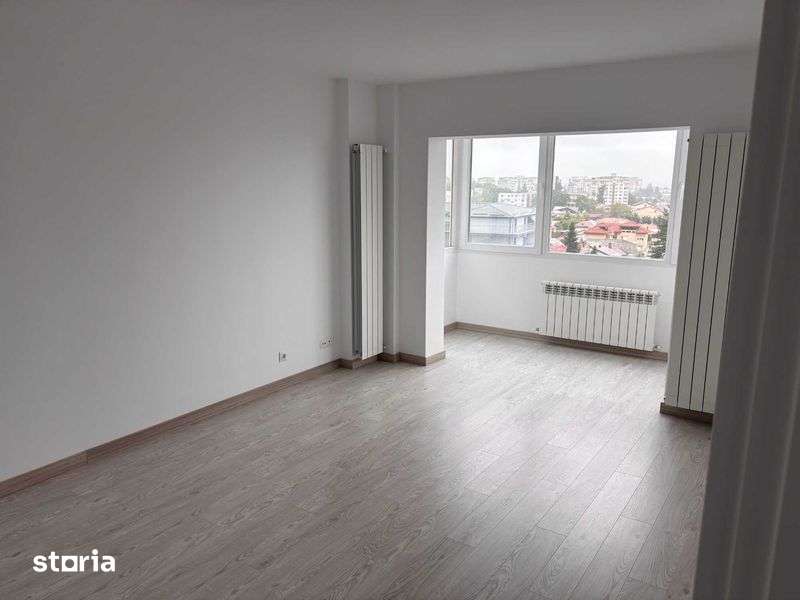 Apartament cu 3 camere, 2 bai, 2 balcoane, decomandat, complet renovat — fotografia 3