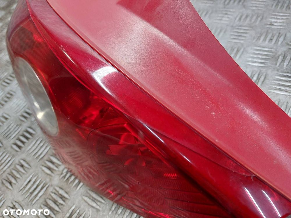 LAMPA LEWY TYŁ + WKŁAD OPEL CORSA D 13186350 89037853 - 4