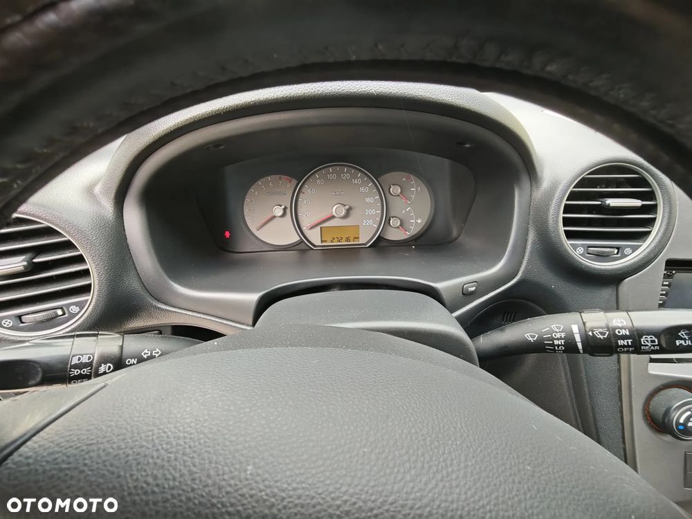 Kia Carens - 12