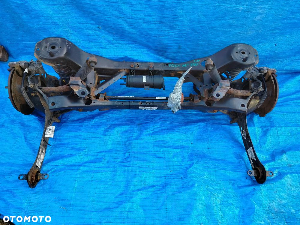 ZAWIESZENIE TYŁ TYLNE BELKA SANKI AMORTYZATORY SPRĘŻYNY WAHACZE TARCZE KOMPLET FORD FOCUS MK3 LIFT 17R ; ORYGINAŁ - 1