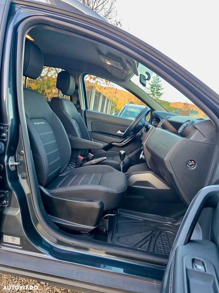 Dacia Duster ver-blue-dci-115-prestige - 12