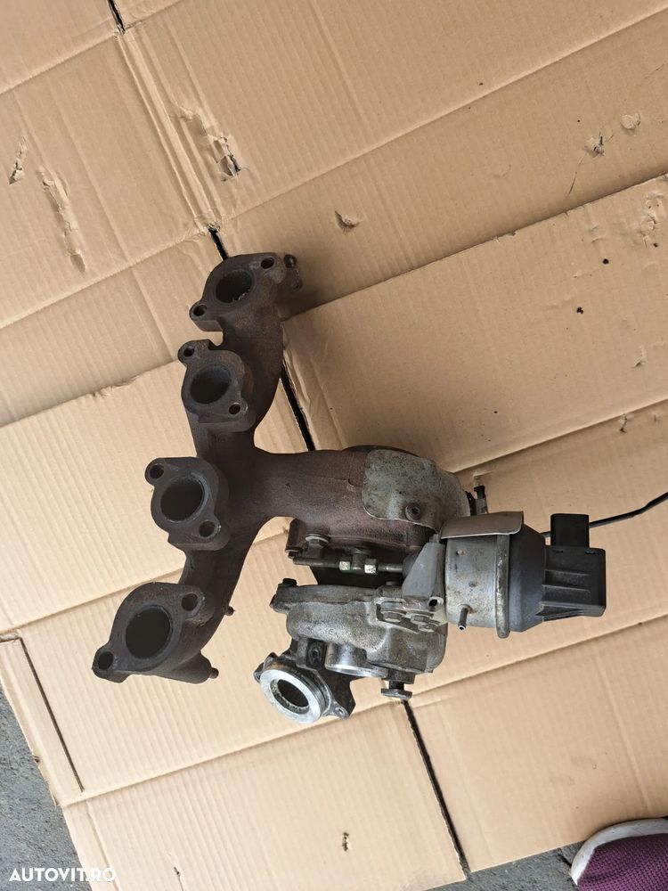 Turbina turbo turbosuflanta cu galerie evacuare Originala VW Passat B6, Golf 6, Scirocco, Tiguan 5n, EOS, Golf 5, 6, Jetta 3, Yeti 5L - 6