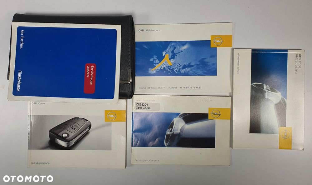 INSTRUKCJA OBSŁUGI + ETUI OPEL CORSA D ZE68204 - 2