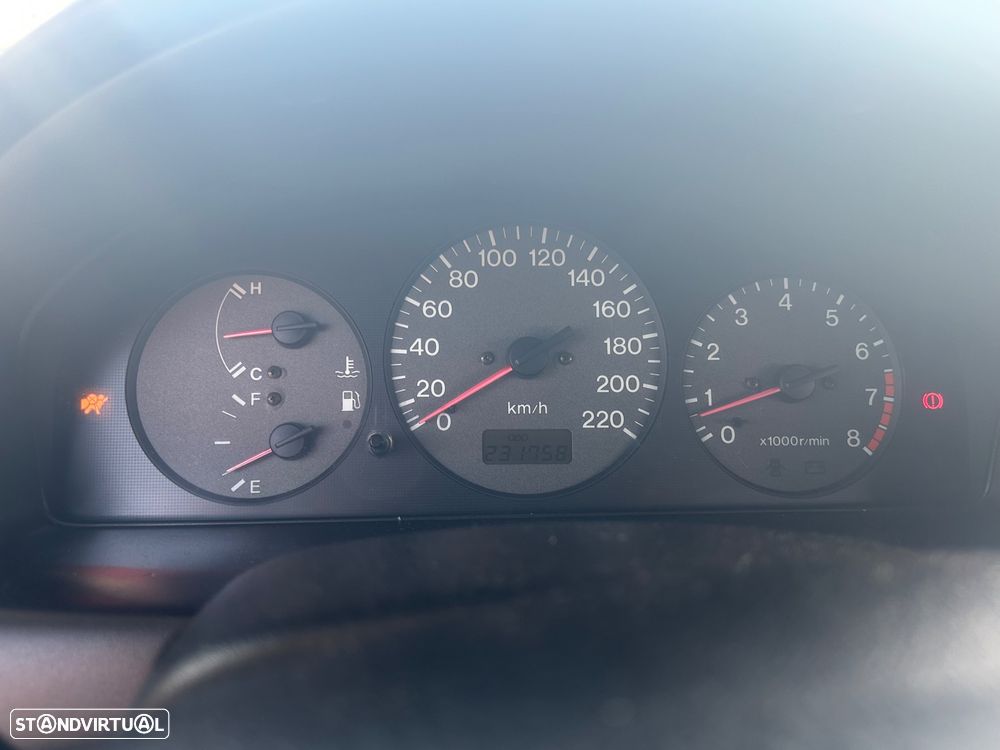 Mazda 323 1.3 - 12