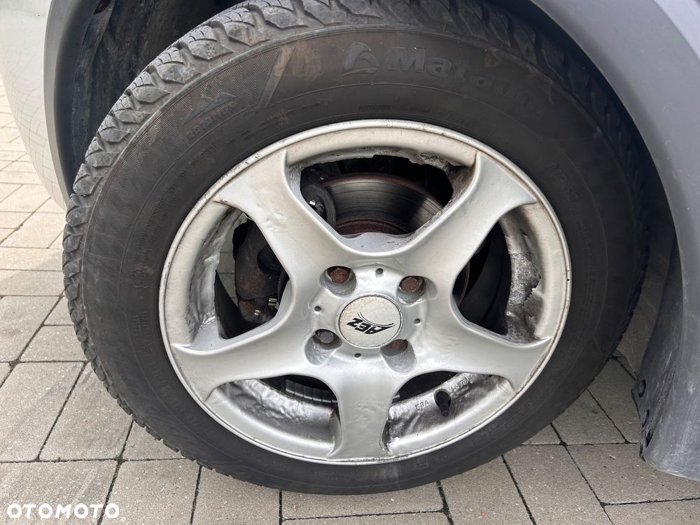 Opel Corsa 1.2 16V Cosmo - 11