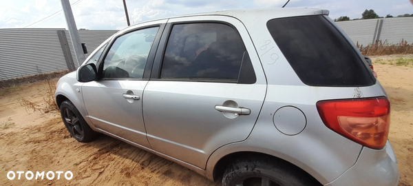 SUZUKI SX4 DRZWI LEWY TYŁ TYLNE LEWE KOMPLETNE Z2S nr. 18/9