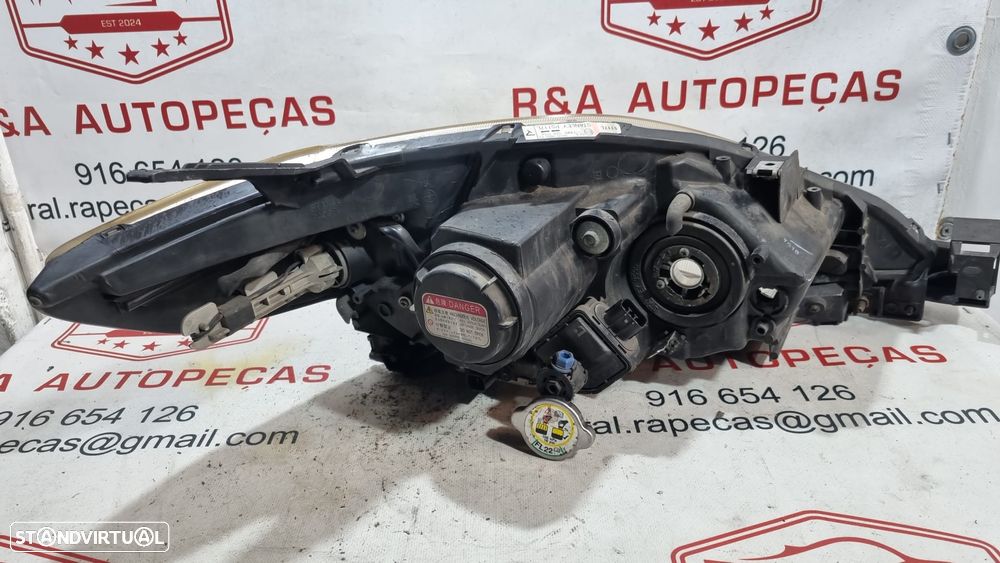 Ótica Farol Frente Frontal Esquerda 5 V Xenón Mazda 2006 149002A011A Original - 3