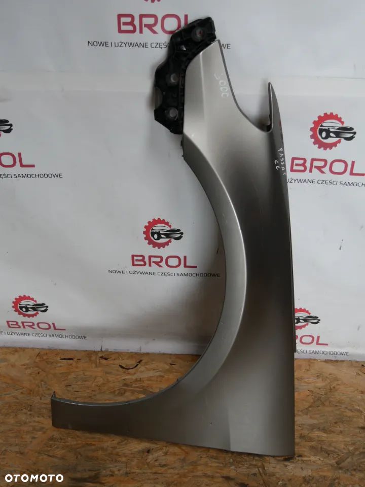 BŁOTNIK PRZEDNI LEWY VW PASSAT CC