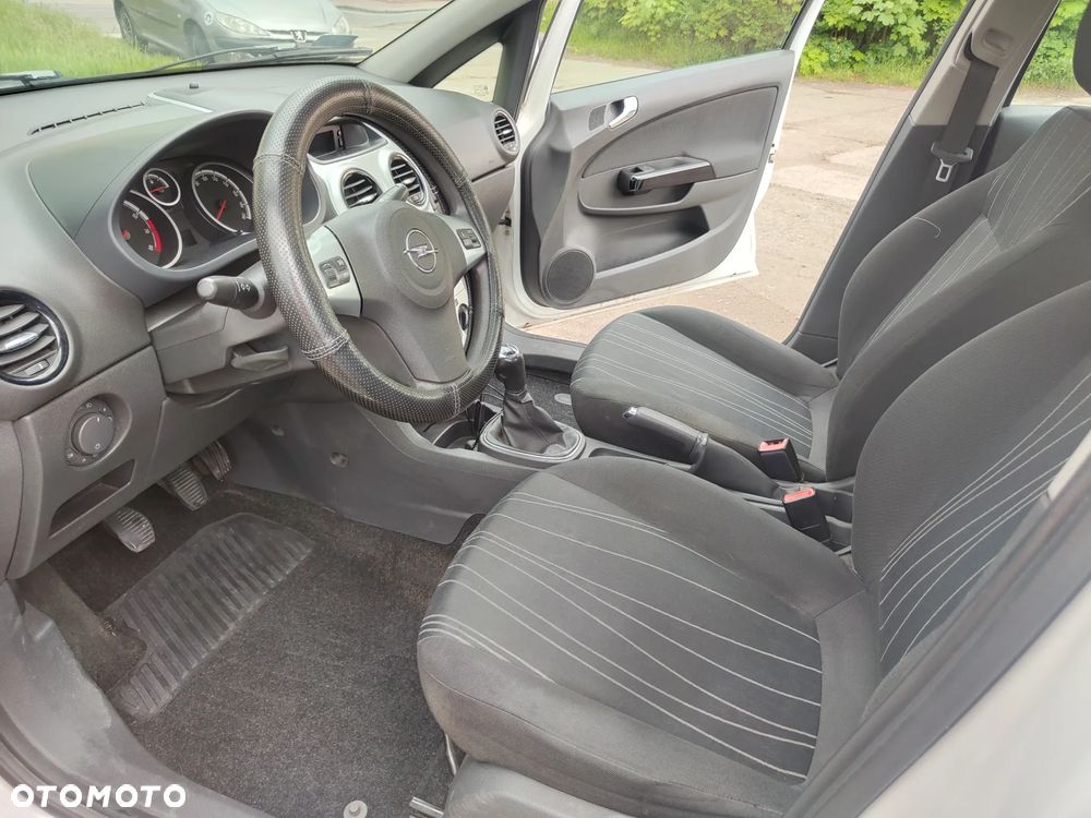 Opel Corsa 1.2 16V Enjoy - 11
