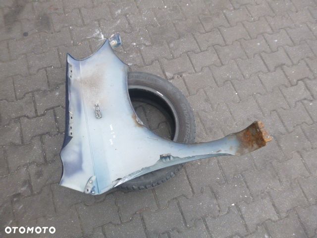 BŁOTNIK LEWY PRZÓD LEWY PRZEDNI TOYOTA YARIS I LIFT 03-05 - 22