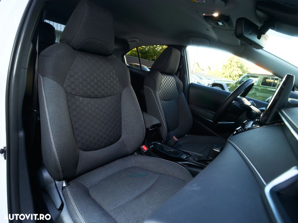 Toyota Corolla 1.8 HSD TS Exclusive - 32